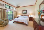 The master bedroom features a king bed, small lanai and AC